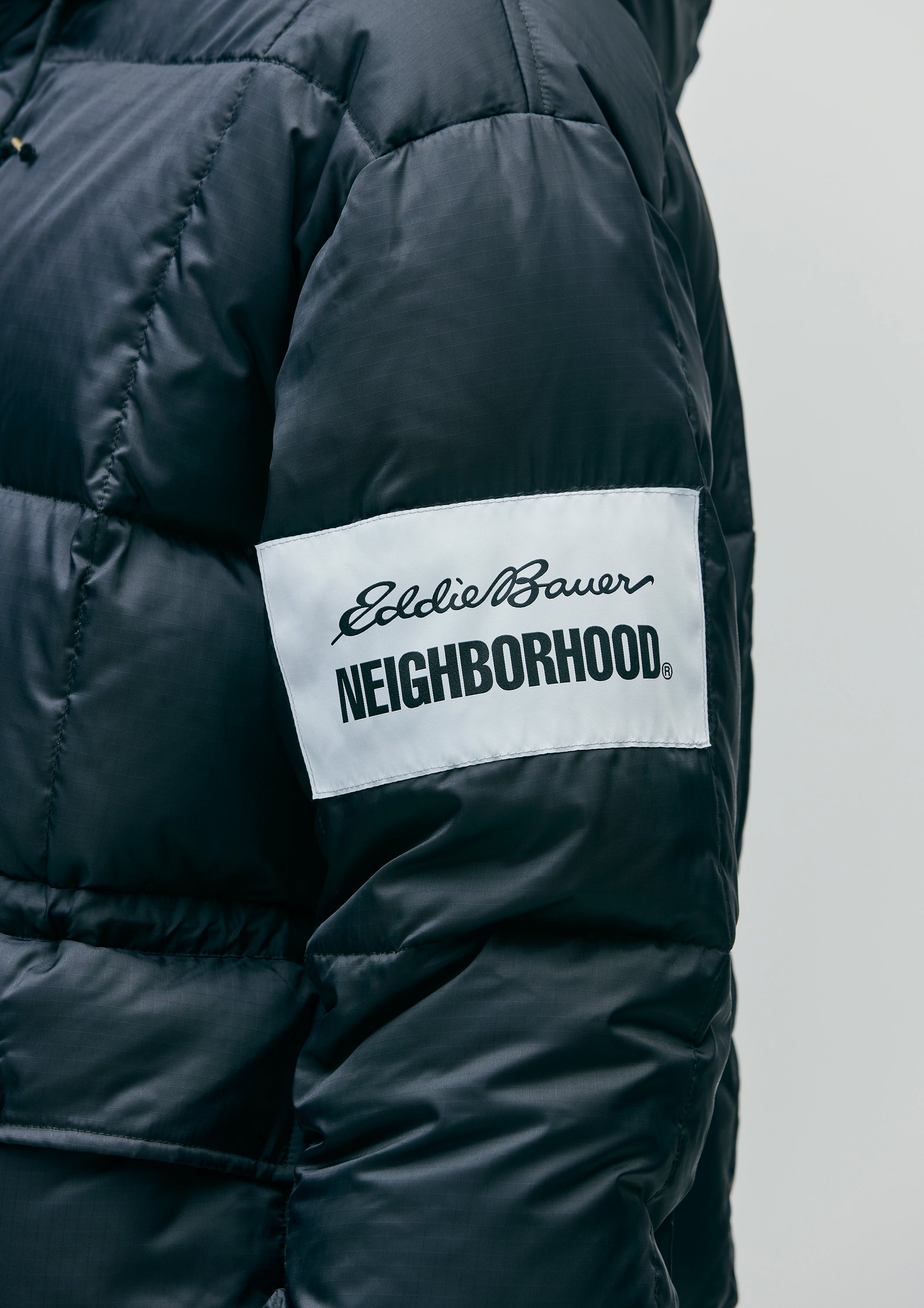 NH X EDDIE BAUER . KARAKORAM DOWN JACKET
